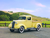 AUT 14 RK1494 01
1937 Chevrolet GC Pickup Truck Yellow 3/4 Front View On Road By Hills