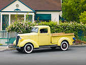 AUT 14 RK1498 01
1937 Chevrolet GC Pickup Truck Yellow 3/4 Front View On Pavement By House