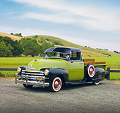 AUT 14 RK1507 01
1950 Chevrolet 3100 Pickup Truck Green And Black 3/4 Front View On Road By Hills