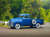 AUT 14 RK1509 01
1950 Chevrolet 3100 Pickup Truck Blue 3/4 Front View On Pavement By Trees