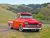 AUT 14 RK1515 01
1958 Chevrolet Cameo Pickup Truck Red 3/4 Front View On Grass By Hills