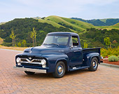 AUT 14 RK1524 01
1955 Ford F-100 Dark Blue 3/4 Front View On Bricks By Hills