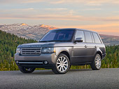 AUT 15 BK0002 01
2012 Land Rover Range Rover Gray 3/4 Front View On Gravel By Trees And Mountains