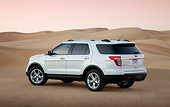 AUT 15 BK0006 01
2012 Ford Explorer White 3/4 Rear View On Sand Dunes At Dusk