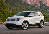 AUT 15 BK0008 01
2012 Ford Explorer White 3/4 Front View On Pavement By Mountains