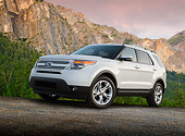 AUT 15 BK0009 01
2012 Ford Explorer White 3/4 Front View On Gravel By Mountains