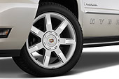 AUT 15 IZ0832 01
2013 Cadillac Escalade Hybrid White Front Wheel Detail Studio