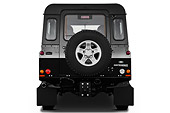 AUT 15 IZ0857 01
2013 Land Rover Defender 110 SW SE SUV Black Rear View On White Seamless