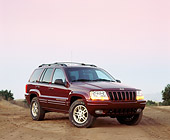 AUT 15 RK0120 09
1999 Jeep Grand Cherokee Limited Burgundy 3/4 Front View On Dirt At Dusk