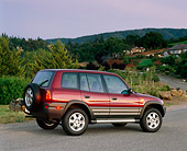 AUT 15 RK0219 03
1996 Toyota Rav 4 Burgundy Rear 3/4 View On Pavement Trees Background At Dusk