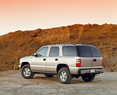 AUT 15 RK0421 02
2000 Chevrolet Tahoe 4WD Pewter 3/4 Rear View On Dirt Filtered