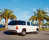 AUT 15 RK0637 02
2003 Chevrolet Suburban White 3/4 Rear View On Pavement By Palm Trees
