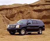 AUT 15 RK0680 03
2003 Cadillac Escalade ESV Black Low 3/4 Side View By Dirt Hill