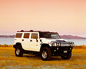 AUT 15 RK0735 01
2003 Hummer H2 White 3/4 Front View On Dry Grass By Water Filtered