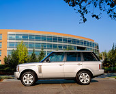 AUT 15 RK0751 01
2004 Land Rover Range Rover HSE Silver Profile View On Pavement By Building Background