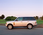 AUT 15 RK0754 02
2004 Land Rover Range Rover HSE Silver Profile View On Pavement By Grass And Trees