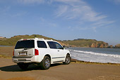 AUT 15 RK0801 01
2004 Infiniti QX56 White 3/4 Rear View On Sand By Ocean