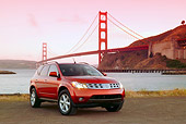 AUT 15 RK0803 01
2004 Nissan Murano Orange Low 3/4 Front View By SF Bridge At Dusk