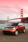 AUT 15 RK0804 01
2004 Nissan Murano Orange 3/4 Front View By SF Bridge At Dusk