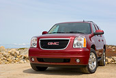 AUT 15 RK0956 01
2007 Chevrolet Yukon Burgundy Low 3/4 Front View On Pavement