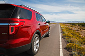 AUT 15 RK1259 01
2013 Ford Explorer Red 3/4 Rear View On Road In Desert