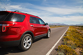 AUT 15 RK1260 01
2013 Ford Explorer Red 3/4 Rear View On Road In Desert