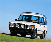 AUT 15 RK0002 07
1996 Land Rover Discovery White 3/4 Front View On Grass Blue Sky