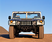 AUT 15 RK0060 01
1996 Hummer H1 Convertible Pick-Up Gray Low Head On View On Dirt Blue Sky