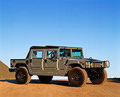 AUT 15 RK0064 06
1996 Hummer H1 Convertible Pick-Up Gray 3/4 Front View On Dirt Blue Sky