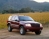 AUT 15 RK0119 03
1999 Jeep Grand Cherokee Limited Burgundy 3/4 Front View On Dirt