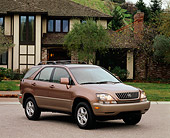 AUT 15 RK0154 04
1999 Lexus RX300 Bronze 3/4 Front View On Pavement By House