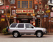 AUT 15 RK0188 07
1999 1/2 Nissan Pathfinder Limited Silver Profile View In Front Of Building