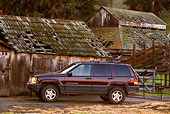 AUT 15 RK0229 02
1996 Jeep Grand Cherokee Burgundy Profile View By Old Barn