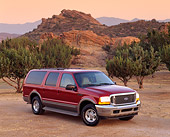 AUT 15 RK0255 03
2000 Ford Excursion Red 3/4 Front View On Dirt By Trees