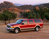 AUT 15 RK0260 05
2000 Ford Excursion Red 3/4 Side View On Dirt By Trees At Dusk