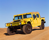 AUT 15 RK0361 05
2000 Hummer H1 Yellow 3/4 Front View On Dirt Hill