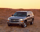 AUT 15 RK0416 05
2000 Chevrolet Tahoe 4WD Pewter 3/4 Front View On Dry Grass Filtered