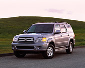 AUT 15 RK0470 02
2001 Toyota Sequoia Gray 3/4 Front View On Pavement By Grass Hills At Dusk