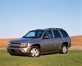 AUT 15 RK0530 05
2002 Chevy Trailblazer LTZ 4WD Pewter 3/4 Front View On Grass Blue Sky
