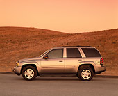 AUT 15 RK0534 01
2002 Chevrolet Trailblazer LTZ 4WD Pewter Profile View On Pavement By Dry Grass Hill Filtered