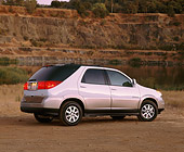 AUT 15 RK0544 05
2002 Buick Rendezvous AWD White 3/4 Rear View On Dirt By Quarry