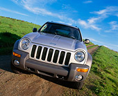 AUT 15 RK0567 01
2002 Jeep Liberty Sport 4WD Silver Head On Shot On Grass Hill