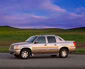 AUT 15 RK0580 02
2002 Cadillac Escalade EXT Silver Sand 3/4 Front View On Pavement