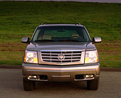 AUT 15 RK0582 03
2002 Cadillac Escalade EXT Silver Sand Head On Shot On Pavement
