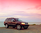 AUT 15 RK0774 03
2004 Jeep Cherokee Limited Burgundy 3/4 Side View On Sand By Water Filtered