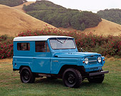 AUT 15 RK0793 01
1961 Datsun Patrol Blue And White 3/4 Side View On Grass By Dry Grass Hills