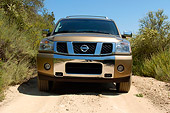 AUT 15 RK0949 01
2004 Nissan Armada Gold Low Head On Shot On Dirt