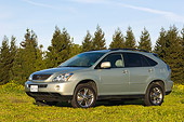 AUT 15 RK0984 01
2006 Lexus RX400 Hybrid Light Green 3/4 Side View By Trees