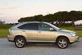 AUT 15 RK0986 01
2006 Lexus RX400 Hybrid Light Green Profile View On Pavement By Trees At Dusk
