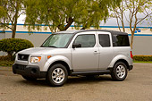 AUT 15 RK0990 01
2006 Honda Element Silver Front 3/4 View On Pavement By Trees